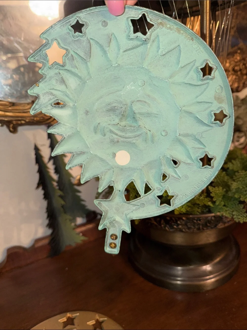 PartyLite hangs wall
